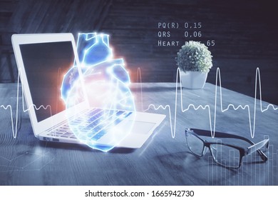 Desktop computer background and heart drawing. Double exposure. Medical study and healthcare concept.