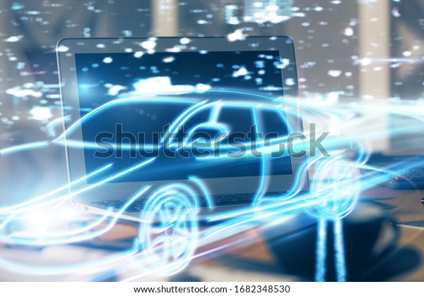 Desktop computer background\
in office with automobile hologram drawing. Multi exposure. Tech\
concept.