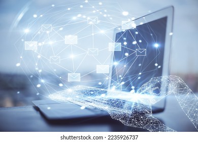 Desktop computer background in office and flying envelops hologram drawing. Double exposure. Electronic mail concept. - Shutterstock ID 2235926737