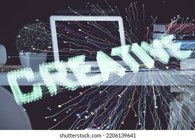 Desktop computer background in office and start up theme hologram drawing. Double exposure. Startup concept.