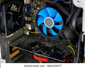 Desktop Computer Covered In Dust. CPU Cooler And Fan In The Dust. Concept Of A Computer Service. Cleaning The Computer's System Unit