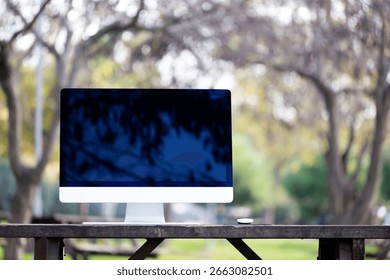 desktop computer displaying 5k solution screen with magic keyboard and mouse, ultra slim design on a Gray background. iMac produced by Apple Inc.