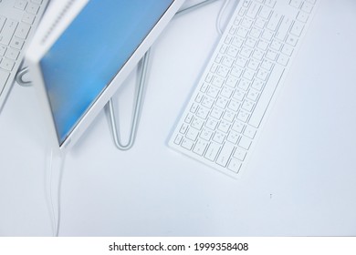  Desktop computer and keyboard and mouse on white