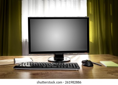 Desktop Computer On The Wooden Table. Work Place.