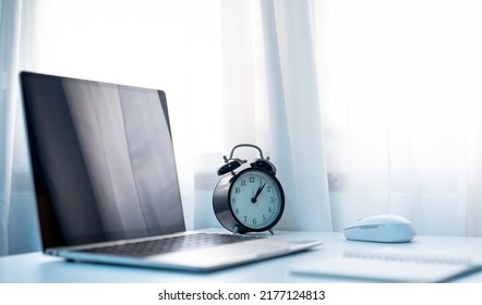 Desktop computer screen on white desk, interior of working room, work from home. home interior of open work space with white desk. packing parcel box for online shipping delivery. small home business.