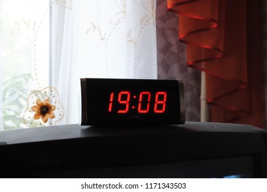 Desktop Electronic Clock In A Dark Room