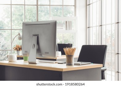 Desktop PC Computers In Small Modern Office Or Home Office. Trendy Workplace Interior.