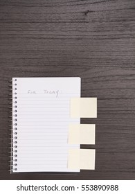 Desktop, Spiral Notebook, Blank Sticky Notes at Side
