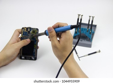 Desktop With Tools. Tester, Multimeter, Screwdrivers, Soldering Iron.