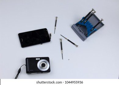 Desktop With Tools. Tester, Multimeter, Screwdrivers, Soldering Iron.