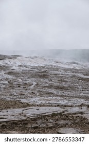 Desolate and alien volcanic crust smoking with geothermal heat in Iceland, inspiring a deep sense of solitude, mystery, and primal earth origins.