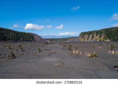 The desolate, empty landscape inside a volcanic crater.