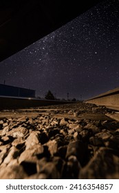 Desolate train track at different times