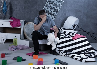 Despair Father Sitting In A Wrecked House After Kidnapping 