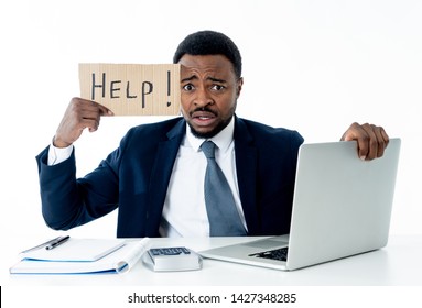 Desperate african american businessman with laptop computer suffering stress at work holding sign asking for help looking sad angry and overworked, Isolated in white. People and business concept. - Powered by Shutterstock