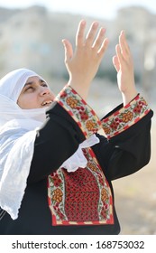 Desperate Arabic Woman Praying