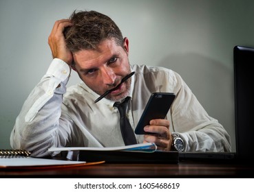 desperate financial executive man in stress - corporate business lifestyle portrait of stressed and overwhelmed businessman working frustrated and anxious having depression problem