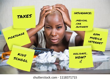 Desperate And Frustrated Black Afro American Woman Domestic Accounting Worried About Money Paying Taxes Calculating Expenses And Payments Suffering Stress And Financial Problem  