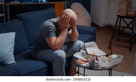 Desperate Frustrated Stressed Lonely Man With Headache Feeling Vulnerable, Depressed, Offended, Injured Lonely Suffering From Abuse, Harassment, Heartbreak, Grieving Person With Psychological Problem.