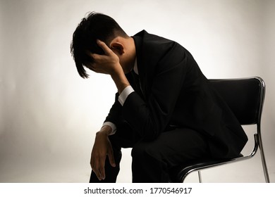 Desperate male company employee, Unemployment concept, Men who are stressed about finding work after being dismissed. - Shutterstock ID 1770546917