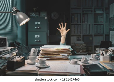 Desperate office worker overwhelmed with paperwork, she is asking help with her hand