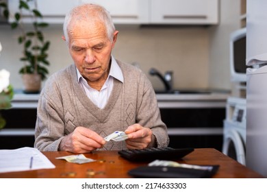 desperate old man pensioner counting his last
