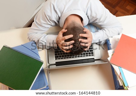  Desperate Overwhelmed Stressed Student  or Businessman at Work 