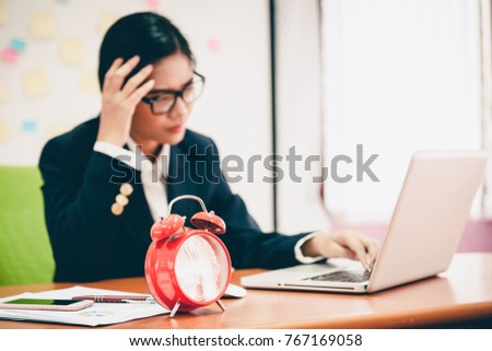 Desperate senior businessman being close to ruin - clock showing five minutes to twelve. Business woman tired of working in the office.
