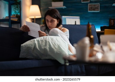 Desperate Woman Feeling Loneliness Frustrated By Bank Invoice Notice, Dismissal Letter, Payment Notification, Bad Financial Report, Money Problem. Worried Tenant By Warning Eviction For Unpaid Bills