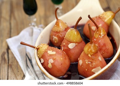 Dessert With Alcohol In Muscatel Pear With Almonds.