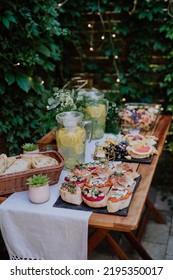 Dessert Buffet At Small Wedding Reception Outside In The Backyard.