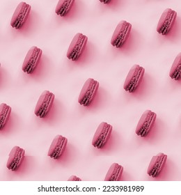 Dessert cake macaron or macaroon on trendy background top view. Flat lay pattern composition. Image toned in Viva Magenta, color of the 2023 year - Shutterstock ID 2233981989