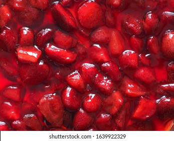 Dessert - Chopped Strawberries In Strawberry Jelly As Texture And Background