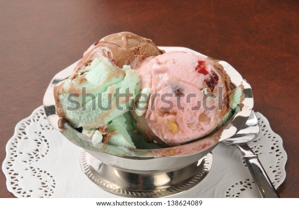 A dessert\
cup of spumoni, an Italian ice\
cream
