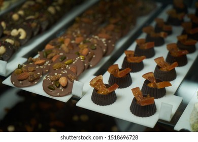 Dessert Display Case With Sweets Candies. Pastry Shop. Variety Of Candy, Close-up