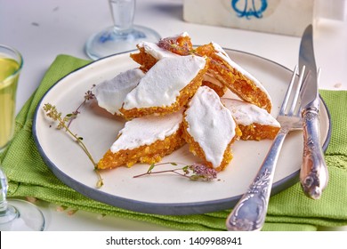 Dessert of French tradition with candied orange and protein in serving with coffee.