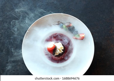 Dessert Frozen With Liquid Nitrogen. Appetizing Dessert With Whipped Cream.