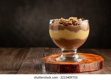 Dessert in the glass. Pastry cream dessert with chocolate ganache. - Powered by Shutterstock