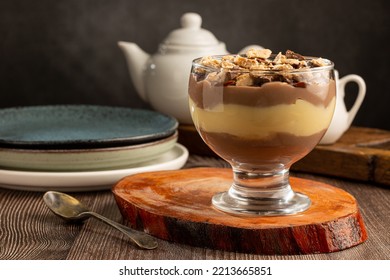 Dessert in the glass. Pastry cream dessert with chocolate ganache. - Powered by Shutterstock