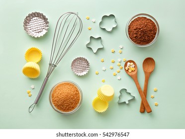 Dessert ingredients and utensils on green pastel background. Top view - Powered by Shutterstock