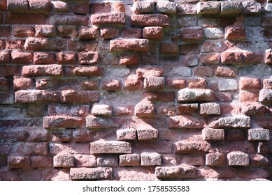 Destroyed Brick Wall Masonry. Background And Texture