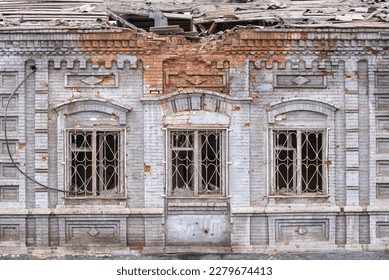 destroyed and burned houses in the city during the war in Ukraine - Shutterstock ID 2279674413