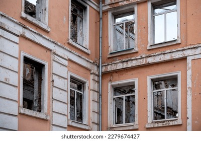 destroyed and burned houses in the city during the war in Ukraine - Shutterstock ID 2279674427