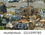 Destroyed by hurricane Ian suburban houses in Florida mobile home residential area. Consequences of natural disaster