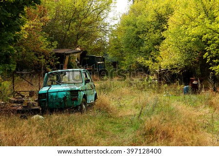 Destroyed car in an abandoned place