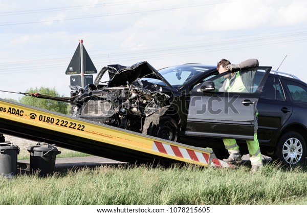 a destroyed car is
towed away after a serious traffic accident, germany, 26.04.2018,
Highway Lübben