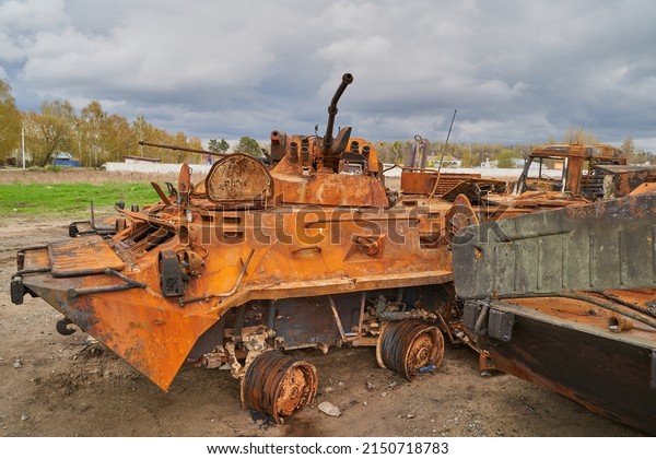 destroyed Russian tank. Russian\
tank at the cemetery of Russian equipment in Ukraine. Burnt Russian\
fuel truck. War in Ukraine 2022. destroyed armored vehicles\
ukraine