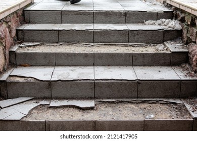 Destroyed Steps On Sidewalk Of City Street