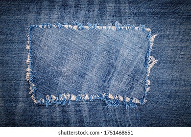 Destroyed Torn Denim Blue Jeans Fabric Patch. Worn Jean Casual Bleached Color Denim.