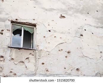 Destroyed wall and window. War consequences in Bosnia